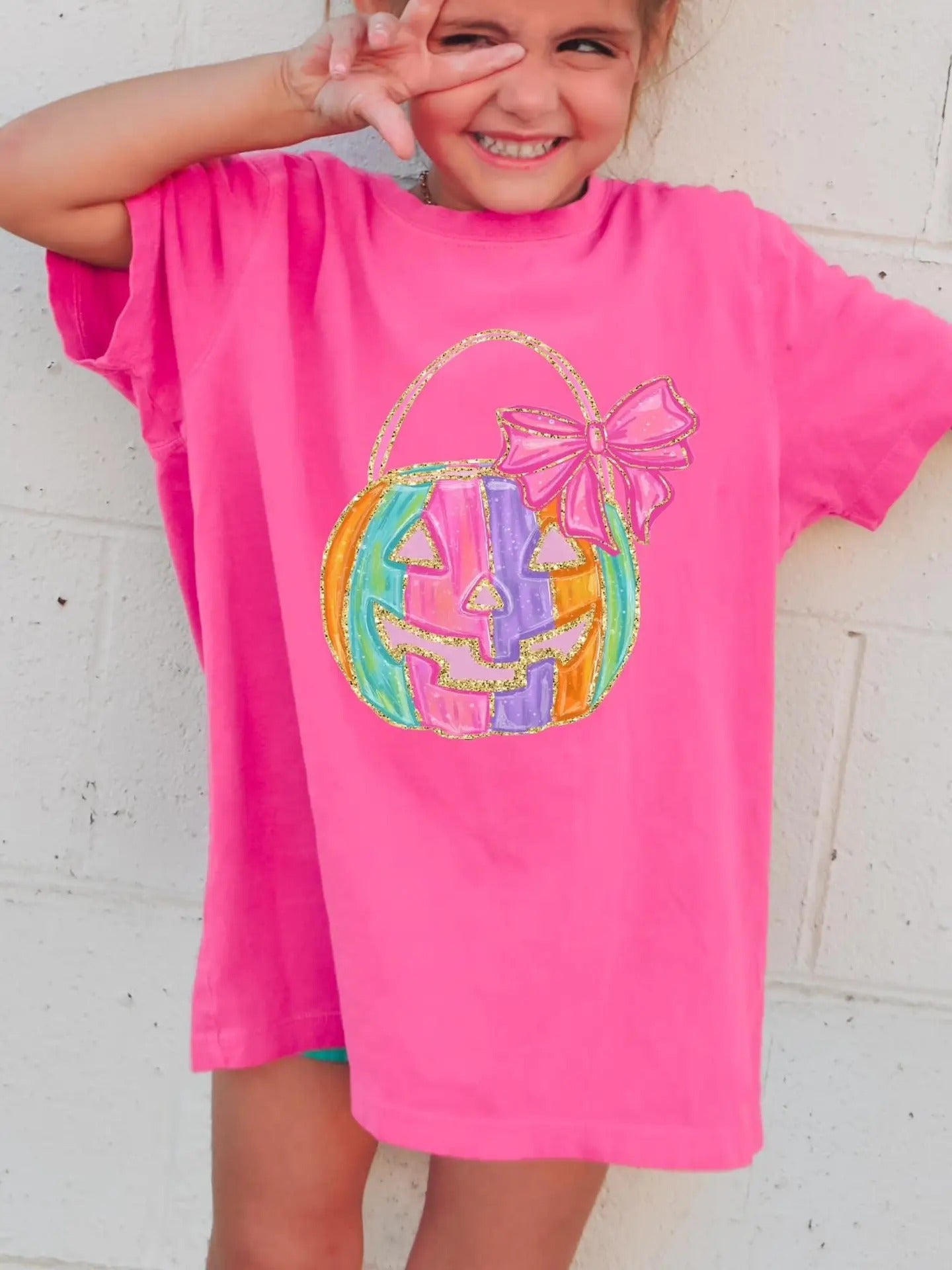 Halloween pumpkin sequin rainbow with pink bow on handle T-shirt (color comfort)