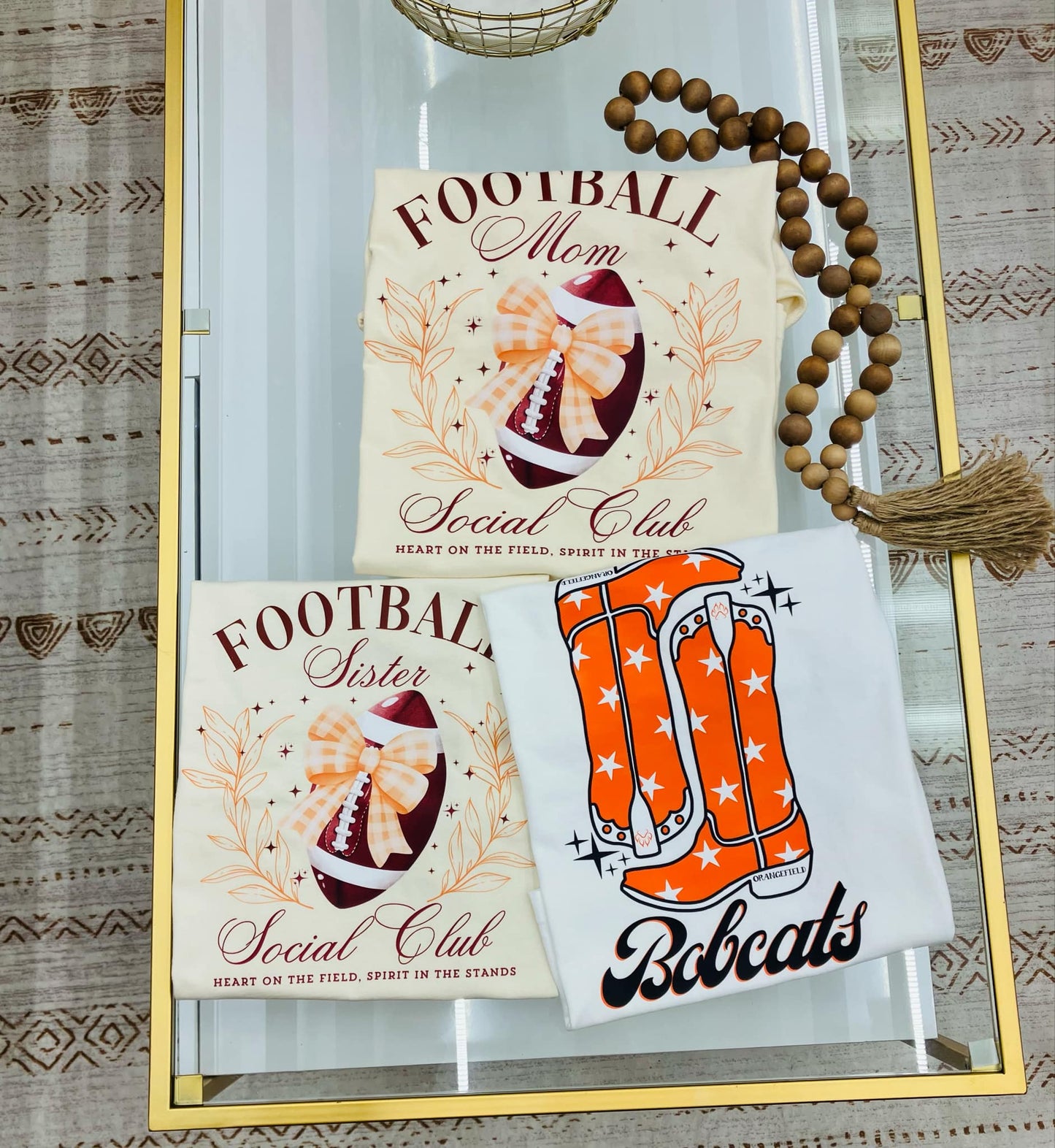 Bobcats boots orange and white T-shirt