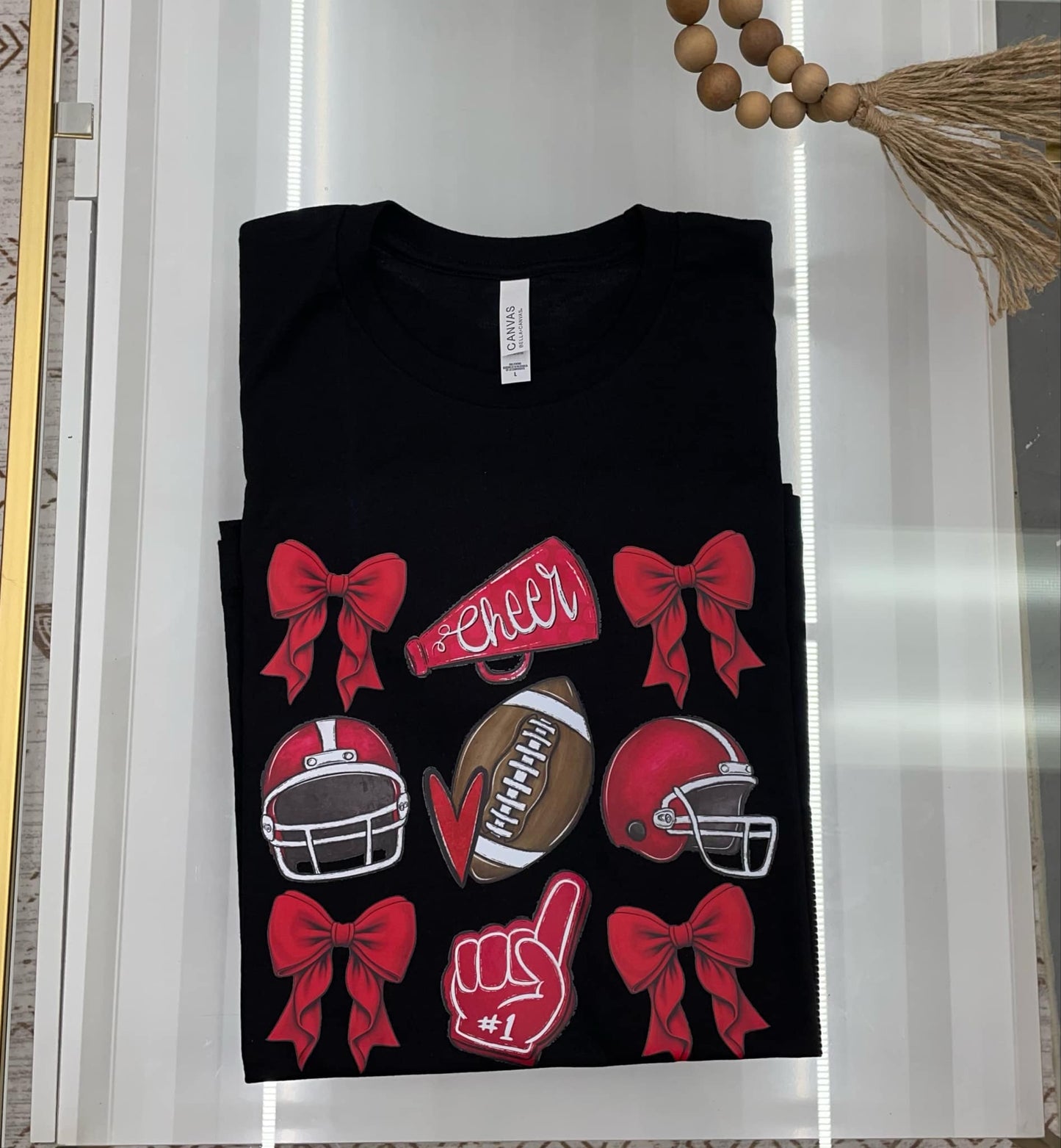 Red Bow, cheer megaphone, red helmet, foam finger t-shirt