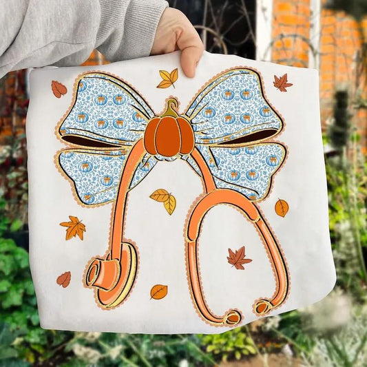NURSE BOW PUMPKIN AND FALL LEAVES 🧡 T SHIRT - (BELLA/COLOR COMFORT)