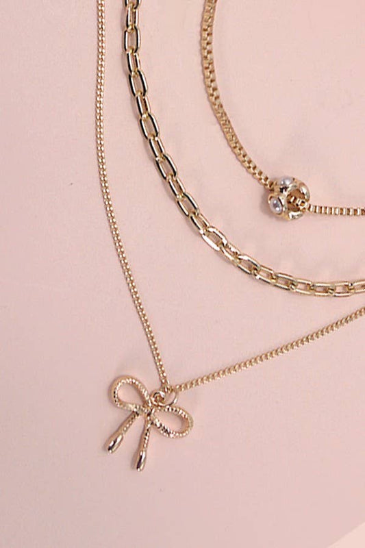 JOSSLYN by Wall to Wall - MULTI LAYER PEARL BOW CAHRM NECKLACE | 80N6