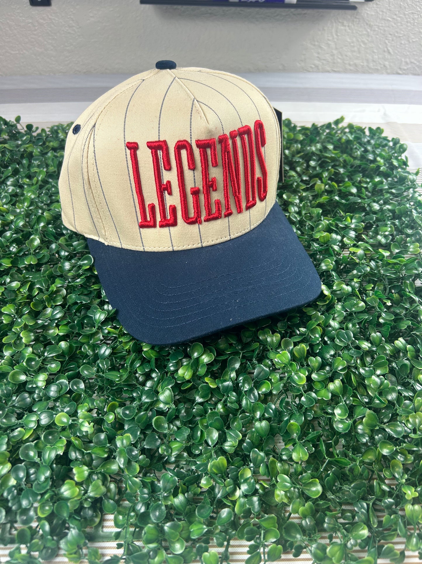 Legends Red Letters Navy and Cream Trucker Hat=121225br