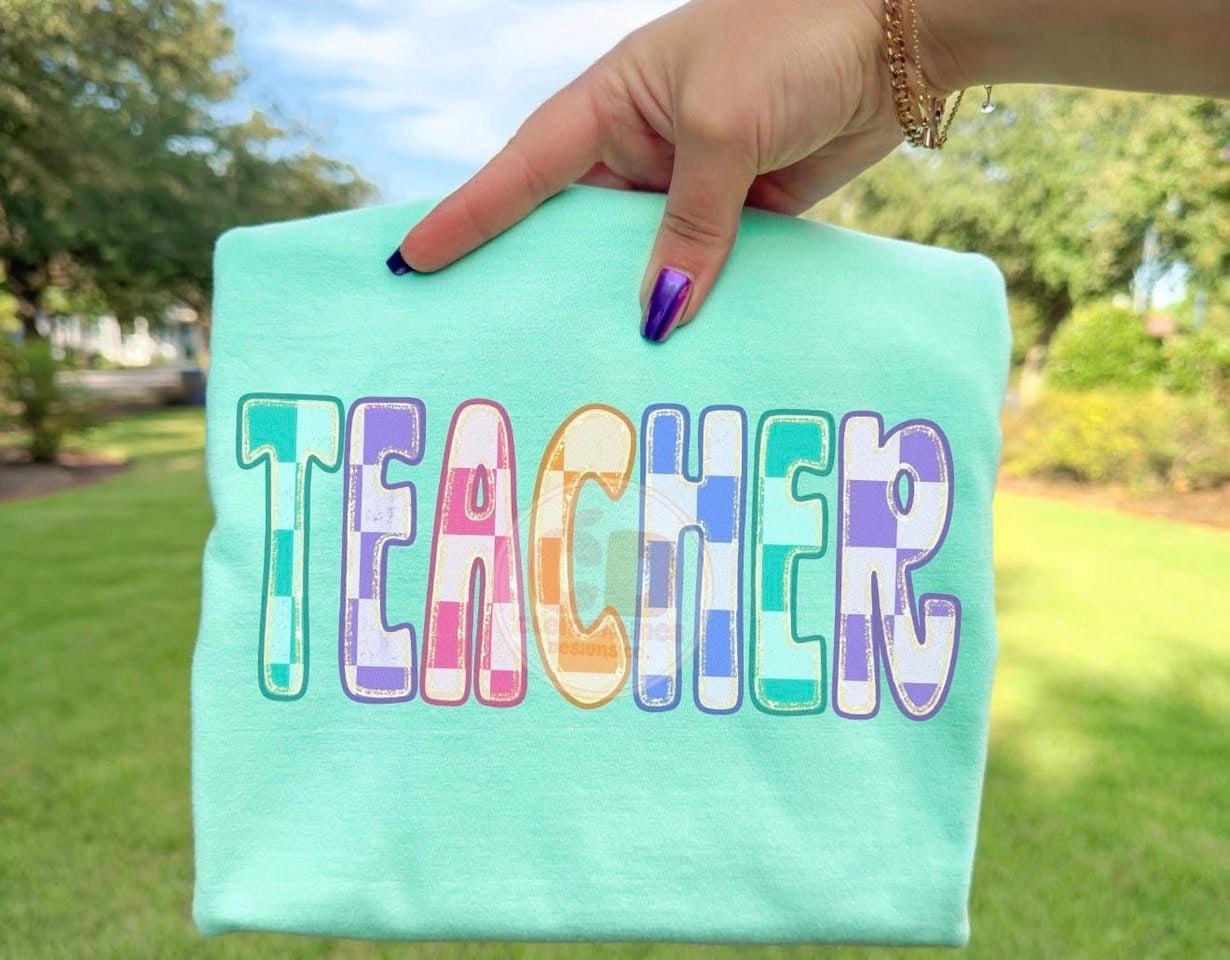 Checkered Glitter Teacher 🧡  - T-SHIRT - (GILDAN/JERZEES)042426LW