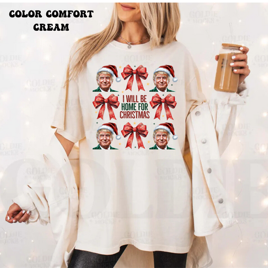 I will be home for Christmas (trump in Christmas hat, red bow font in the center)   T-SHIRT