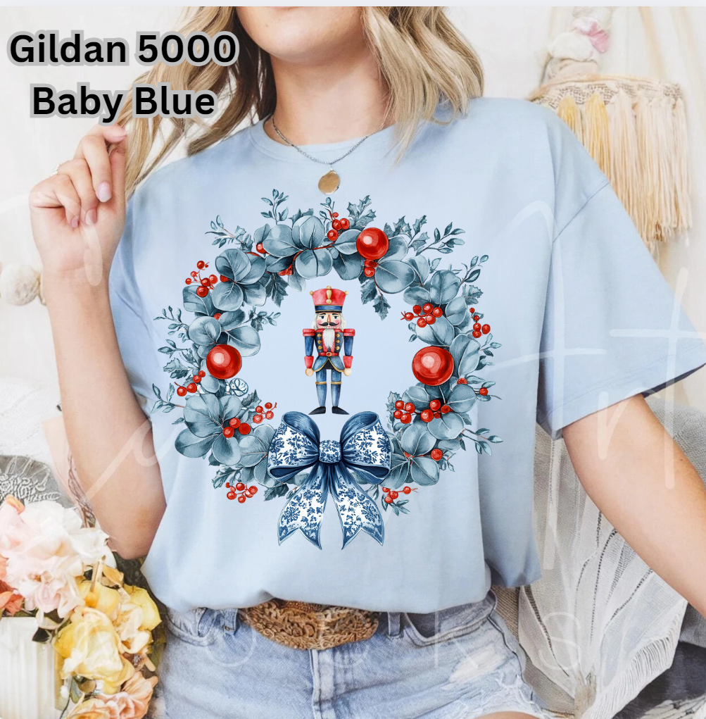 Nutcracker and wreath (blue wreath red ornaments, blue and white bow) T SHIRT (GILDAN ONLY)