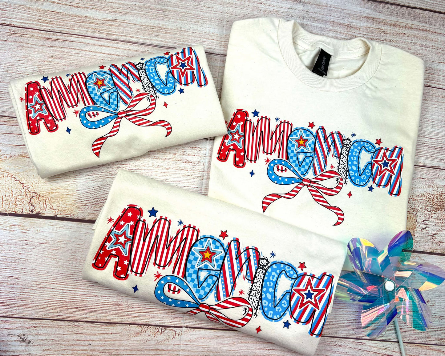 America with Bow - T SHIRT - (Jerzee/Gildan)